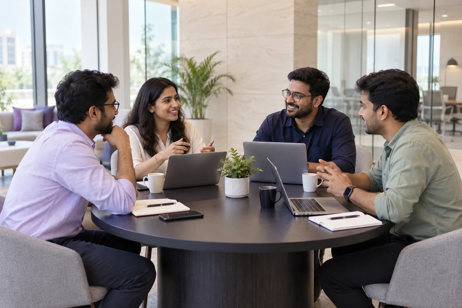 A team discussing a project around a meeting table